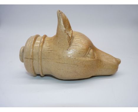 A salt glaze flask in the form of a Fox head, no stopper present, some chips to the ears, 6 1/2'' long.