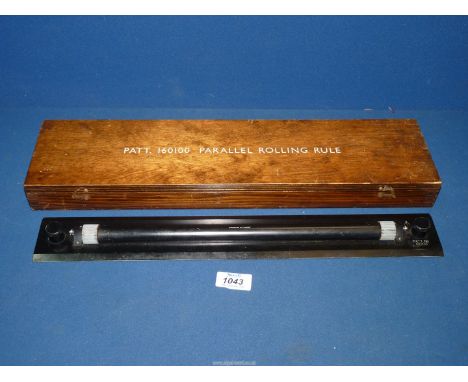 A WWII Military Rolling Parallel Ruler for a ship's navigation officer, broad arrow, war department pattern no. 160100, boxed