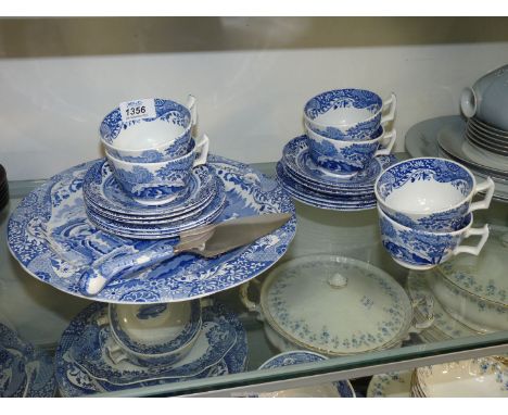 A quantity of Spode Italian tea ware to include; six cups, saucers and tea plates, a cake plate and slice, etc.