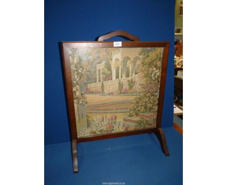 A Firescreen with inset tapestry of a classical garden scene, 21'' wide x 26 1/2'' high.