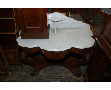 An elegant Marble topped Console Table having substantial cabriole front legs terminating in well carved paw feet and having 