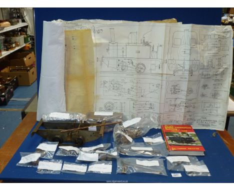 A 'TICH' steam Locomotive assembly kit, a quantity of engineers model plans and a book.