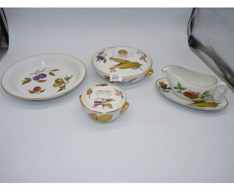 A small quantity of Royal Worcester dinnerware including vegetable dish with lid, sauce bowl with lid, gravy boat and saucer 