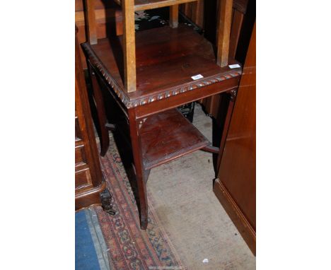 A rectangular Mahogany occasional Table having rope style beading, the canted flared square legs united by a lower shelf, 19 