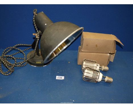 A Gamage infra red light and two bulbs.