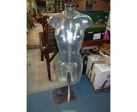 A clear torso shop mannequin, 49" tall. N.B. VAT at 20% will be added to the hammer price of this lot.