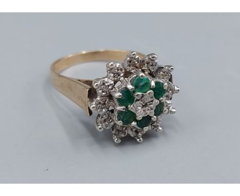 A 9ct gold Diamond and Emerald cluster ring, 6.1gms, ring size Q