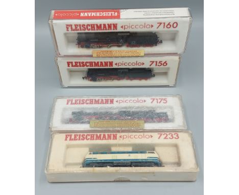 A Fleischmann locomotive, Piccolo, number 7156 together with another, 7160, another 7175 and another 7233