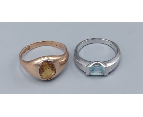 A 9ct gold ring set with a Citrine togther with another similar 9ct white gold ring, 6.3gms