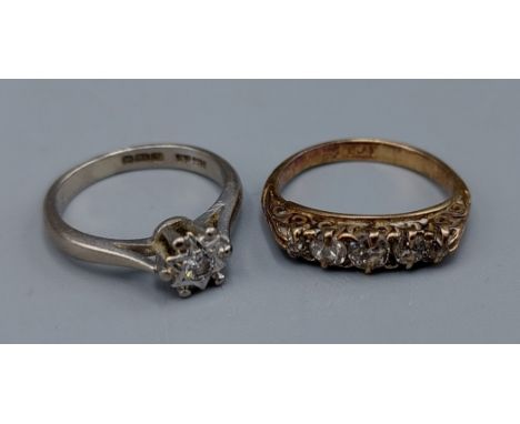 An 18ct gold solitaire Diamond ring, 3gms, ring size G together with an 18ct gold five stone Diamond ring, 2.5gms, ring size 