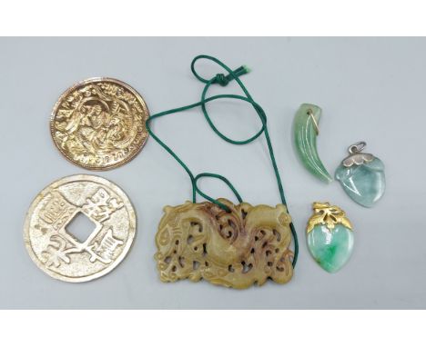 A Chinese Jade pendant together with three similar Jade pendants and two Chinese coins 
