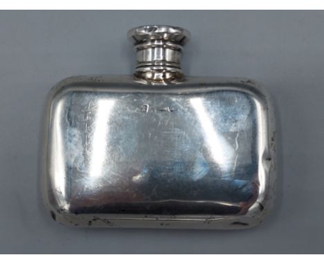 A silver hip flask, marks rubbed, 8cms wide