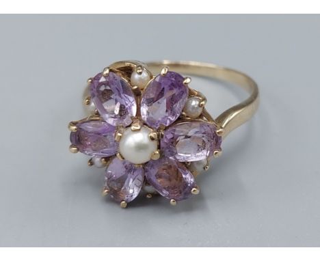A 9ct gold Amethyst and Pearl set cluster ring, 3.6gms, ring size P