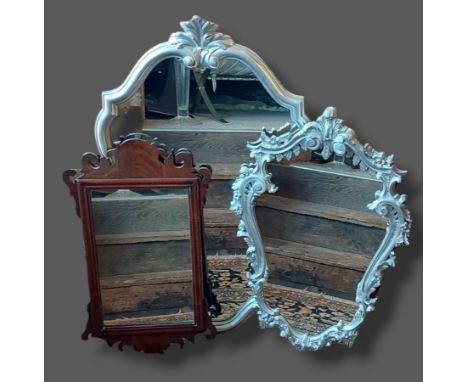A Chippendale style wall mirror together with two modern silvered wall mirrors 
