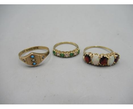 9ct yellow gold five stone garnet and opal ring, size M1/2, a 9ct gold ring set with green and clear stones, and an antique s
