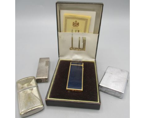 Dunhill Rollagas gold plated butane cigarette lighter with dark blue panels, base stamped with original box and paperwork, H6