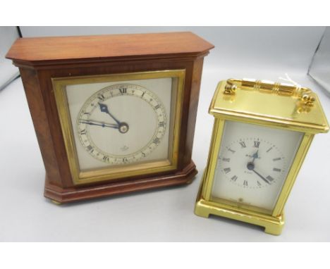 Elliot 8 day walnut mantle timepiece on brass bun feet, brass bezel enclosing signed 3 1/2" silvered dial with applied Roman 