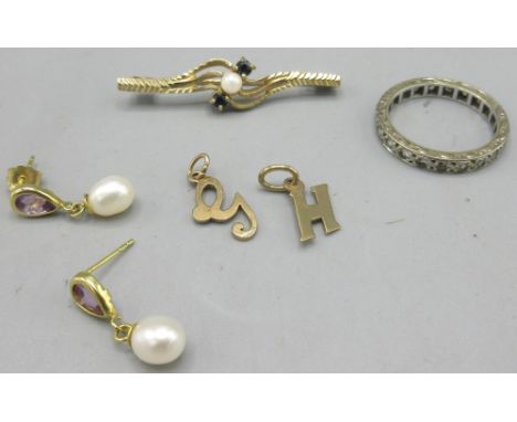 9ct yellow gold pin brooch set with sapphires and pearl, a 9ct gold clear stone eternity ring, size K, 9ct gold G and H penda