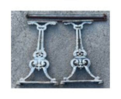 Pair of Victorian cast iron white pained bench ends and struts