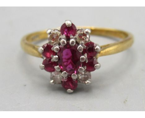 18ct yellow gold and platinum diamond and ruby cluster ring, stamped 18ct Plat, size M1/2, 2.69g