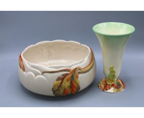 Clarice Cliff, Newport Pottery, trumpet form vase, the base moulded with flowers, H17.5cm, and a salad bowl decorated with au