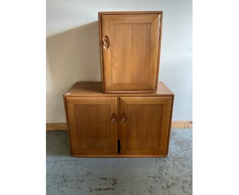 Ercol light elm two door cabinet and a similar single door cabinet, W91cm D43cm H61cm max (2)