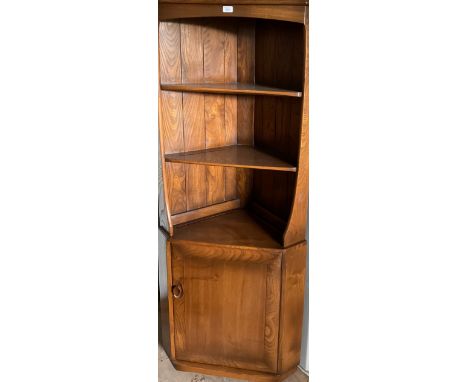 Ercol dark elm corner cabinet, W77cm D43cm H180cm