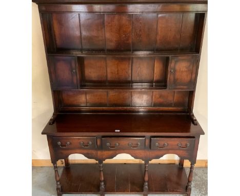 Georgian style oak pot-board dresser, twin shelf back with two cupboards, W146cm D45cm H185cm, and a similar wall rack (2)