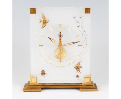 A Jaeger LeCoultre 'Marina' desk clock with lucite and brass body with fish design, having baguette movement with brass dagge