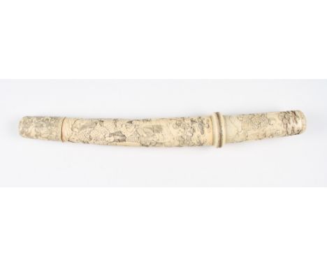 An early 20th Century Japanese Tanto dagger having carved ivory scabbard and handle, the scabbard decorated with a deep carve