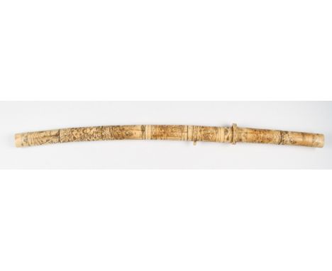 An early 20th Century Japanese sword with carved bone handle and scabbard, the scabbard body of five-piece construction with 