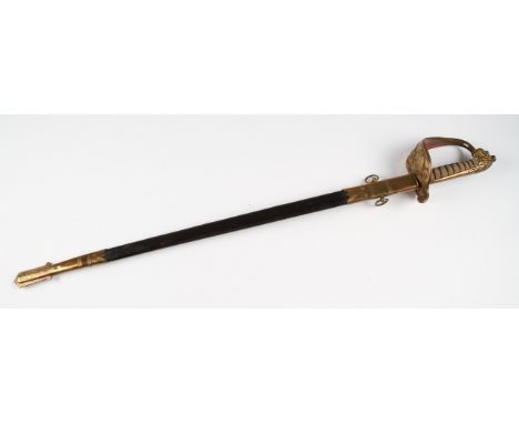 A 19th Century Victorian officers naval dress sword, the patterned blade having foliage design bearing name (Ray) Horatio Edw