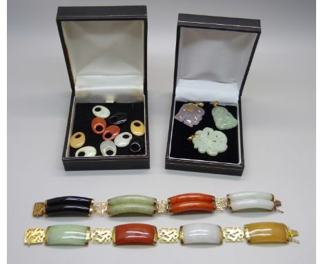 Two 14ct gold mounted multi-coloured gold jade bracelets, three jade pendants and a collection of jade charms 