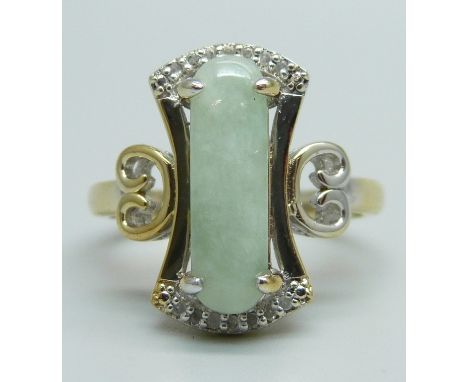 A silver gilt, jade and fourteen diamond designer ring, R 