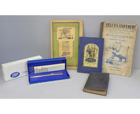 Three books, Tell Us Another, The Giants and How To Fight Them, a 19th Century prayer book, a Boots Centenary Year Parker bal