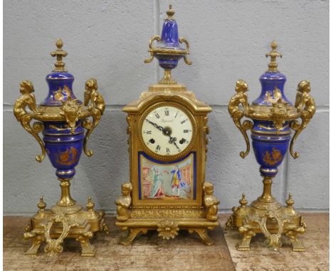 A French Sèvres style three piece gilt bronze and porcelain clock garniture, with decorative ceramic panel, German movement 