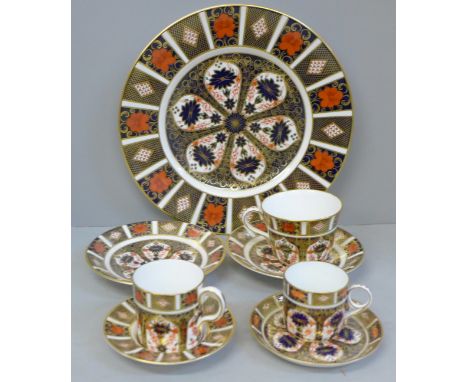 Royal Crown Derby 1128 pattern china; dinner plate, three various cups and four saucers 