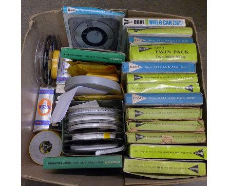 Thirty-one 8mm film reels, 1960s and three projector lamp bulbs 