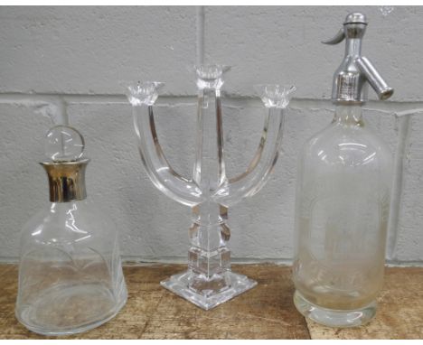 A glass soda syphon, Wadworth &amp; Co, Devizes, crystal decanter and candlestick 