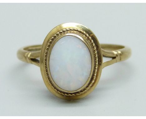 A 9ct gold and opal ring, 1.6g, J 