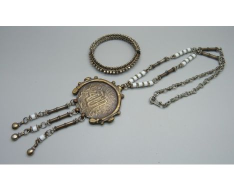An Eastern white metal bangle and an Eastern necklace 