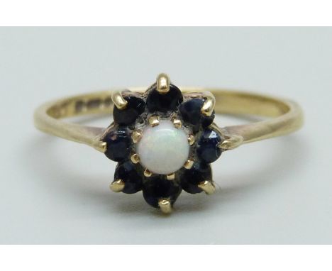 A 9ct gold, sapphire and opal ring, 2.1g, O 