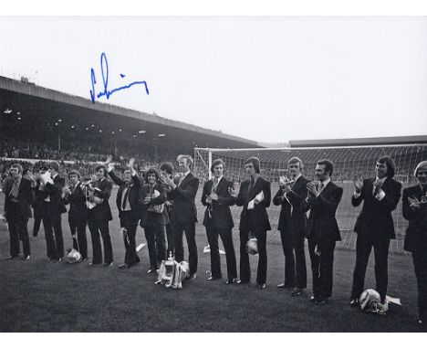 Autographed PETER LORIMER 8 x 6 photo : B/W, depicting Leeds United players standing shoulder to shoulder as they applaude th