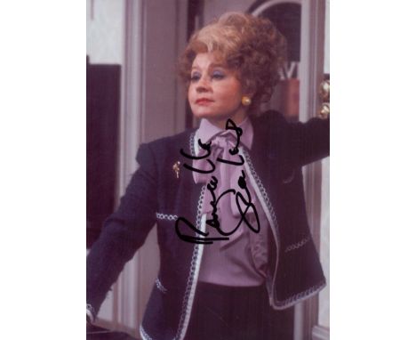 Prunella Scales signed 7x5 inch Fawlty Towers colour photo. Good condition. All autographs come with a Certificate of Authent