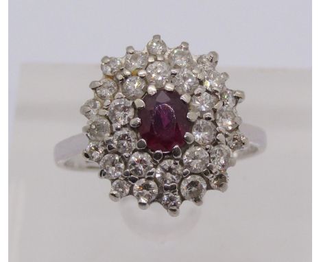 18ct white gold ruby and diamond cluster ring, stamped '504' to interior, size S/T, 6.1g 