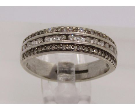 Modern 9ct white gold diamond half eternity ring, size I, 2.5g 