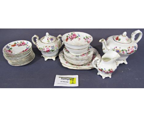 A collection of tea wares with printed floral detail comprising teapot, covered sucrier, milk jug, sugar bowl, one tea cup, t