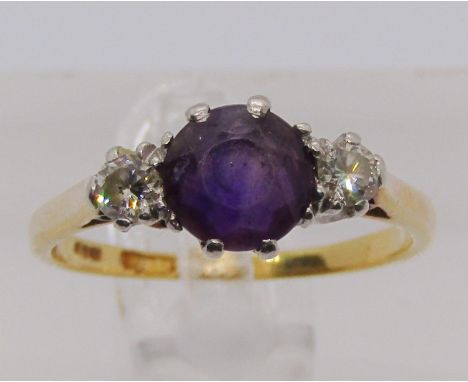 18ct amethyst and diamond three stone ring, size M/N, 3.1g 