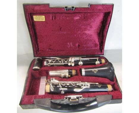 A Buffet Crampon B12 Clarinet Paris  in five sections in  a velvet lined plastic case. 