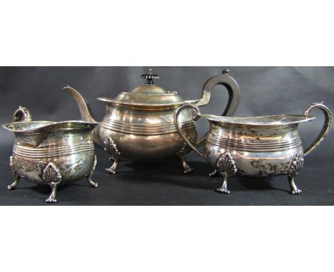 A silver three piece Georgian style tea service comprising teapot, sugar bowl and jug, Birmingham 1938, maker William Hair Ha